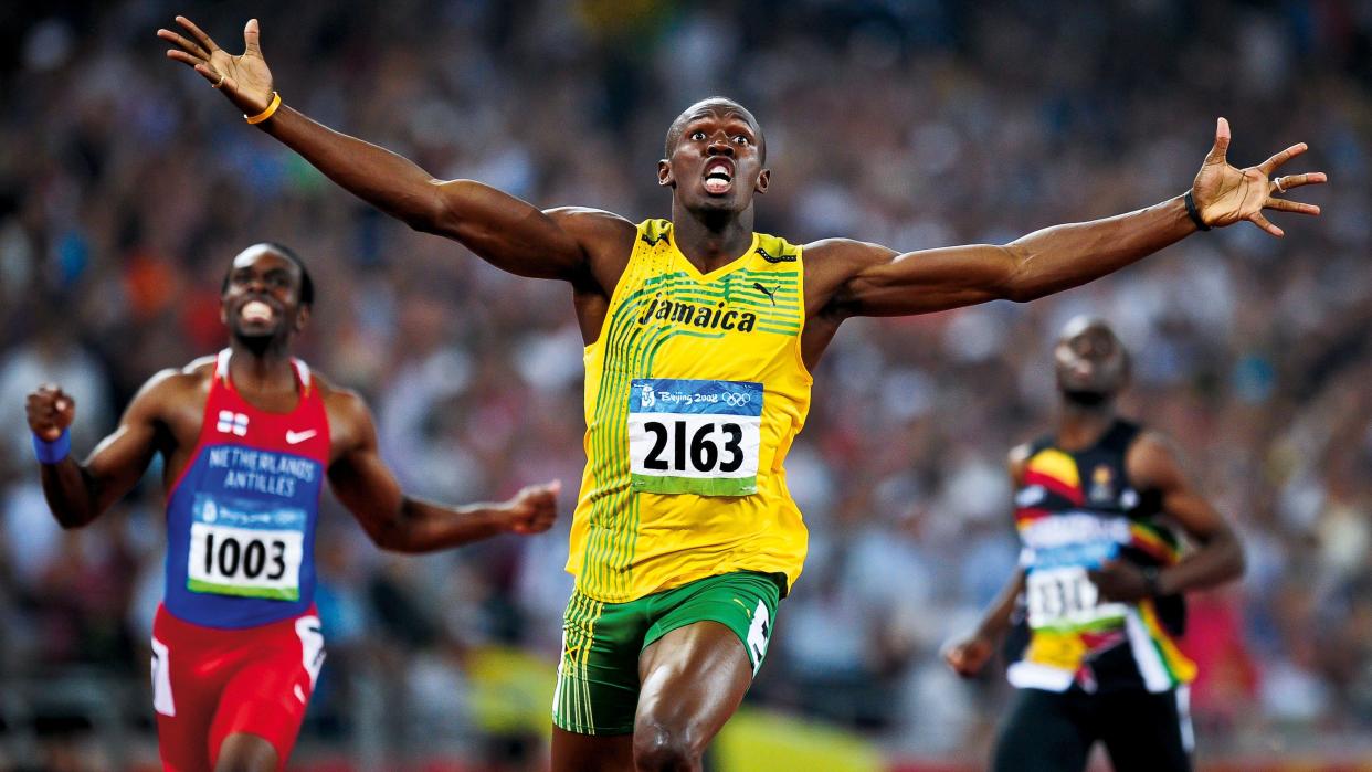 Usain Bolt celebrates winning gold in the men's 100m at the 2008 Olympics