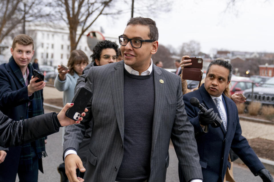 Rep. George Santos, R-N.Y., leaves a House GOP conference meeting on Capitol Hill in Washington, Wednesday, Jan. 25, 2023. (AP Photo/Andrew Harnik)