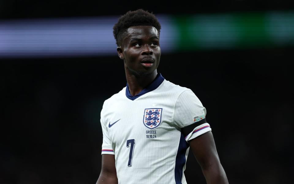 Injury worry: Arsenal winger Bukayo Saka was forced off early in the second half of England’s shock defeat by Greece (The FA via Getty Images)