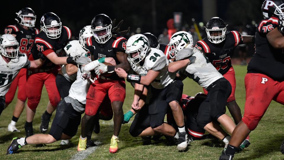 Palmetto's linebacker Kyrie Marshall gets a few yards against Lakewood Ranch on Friday at Harllee Stadium in Palmetto on October 14, 2022.