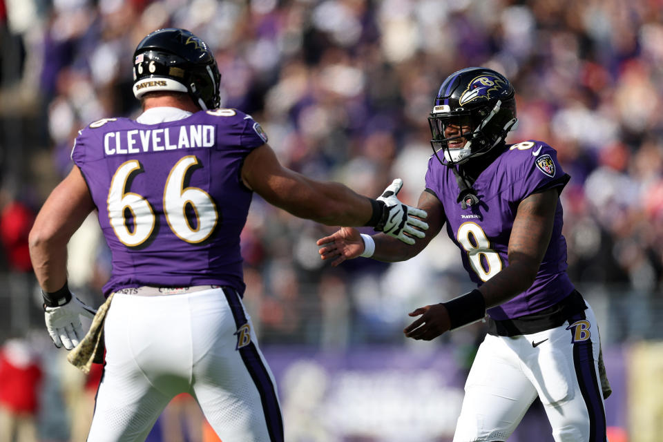 BALTIMORE, MARYLAND – NOVEMBER 12: Lamar Jackson #8 of the Baltimore Ravens celebrates with Ben Cleveland #66 after a touchdown against the Cleveland Browns during the first quarter at M&T Bank Stadium on November 12, 2023 in Baltimore, Maryland. (Photo by Todd Olszewski/Getty Images)