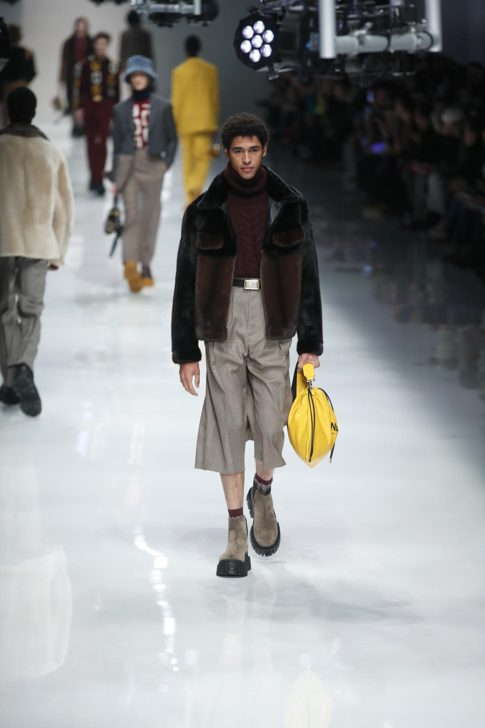 A model wears a creation as part of the Fendi men's Fall-Winter 2020/21 collection, that was presented in Milan, Italy, Monday, Jan. 13, 2020. (AP Photo/Antonio Calanni)