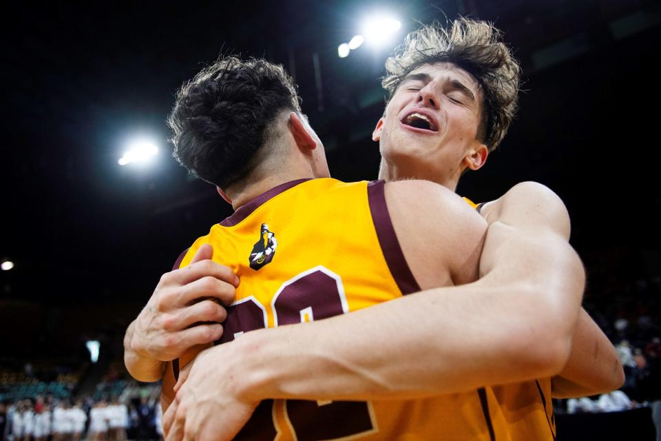 Windsor High School boys basketball player Madden Smiley celebrates a Colorado Class 5A Final 4 win over Vista PEAK Prep on Thursday, March 7, 2024 at the Denver Coliseum in Windsor, Colo.