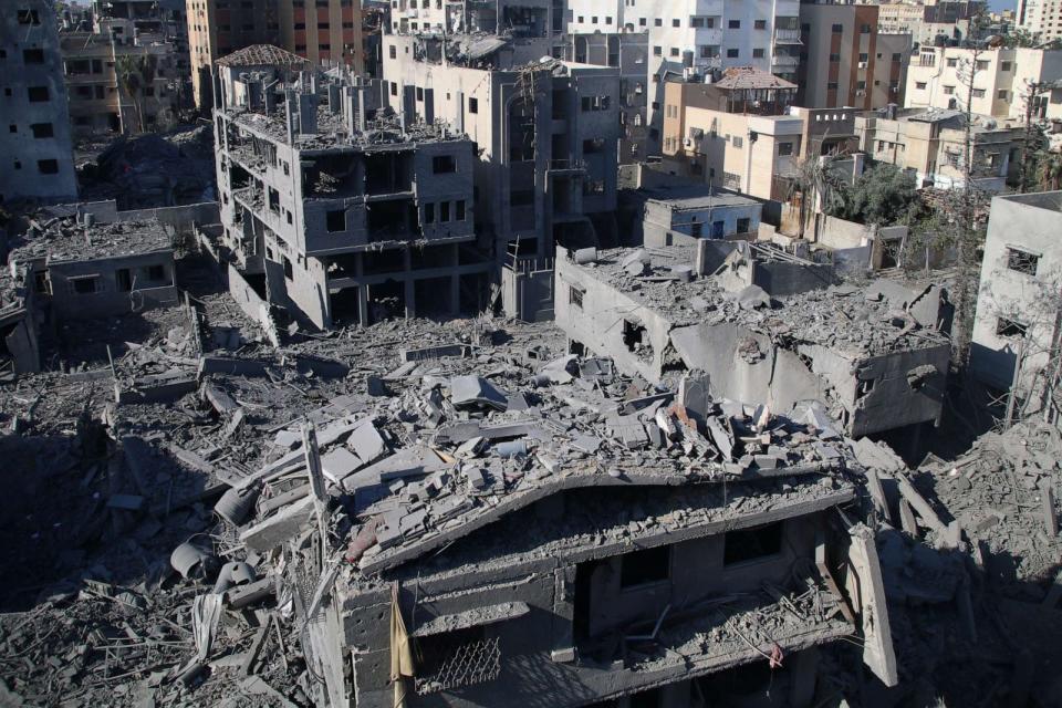 PHOTO: Citizens inspect damage to their homes caused by Israeli airstrikes, Oct. 13, 2023 in Gaza City, Gaza. (Ahmad Hasaballah/Getty Images)