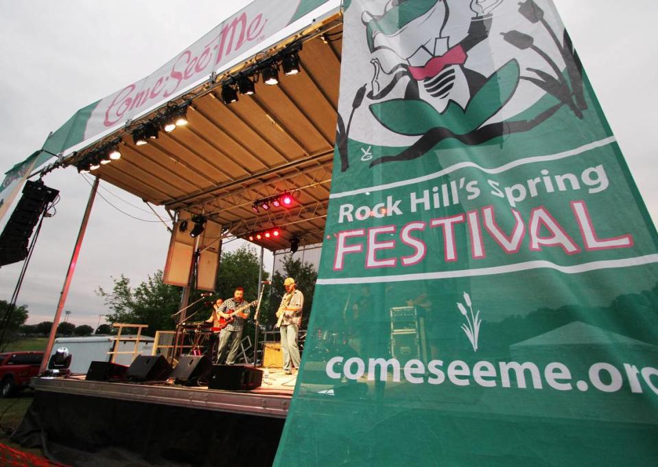 A band performs on a large stage at Winthrop Lake for the Moonlight Jazz and Blues event as part of the Come-See-Me Festival.