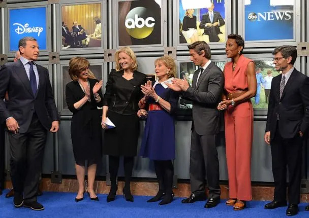 PHOTO: Disney and ABC Television executives and ABC News anchors join Barbara Walters at the dedication ceremony as ABC News headquarters in New York is proclaimed The Barbara Walters Building on May 12, 2014. (Slaven Vlasic/Getty Images)