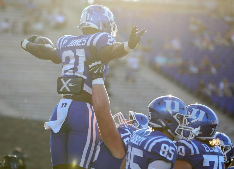 Duke’s Peyton Jones celebrates with teammates after scoring a touchdown during the second half of the Blue Devils’ 38-14 win over Northwestern on Saturday, Sept. 16, 2023, at Wallace Wade Stadium in Durham, N.C. Kaitlin McKeown/kmckeown@newsobserver.com