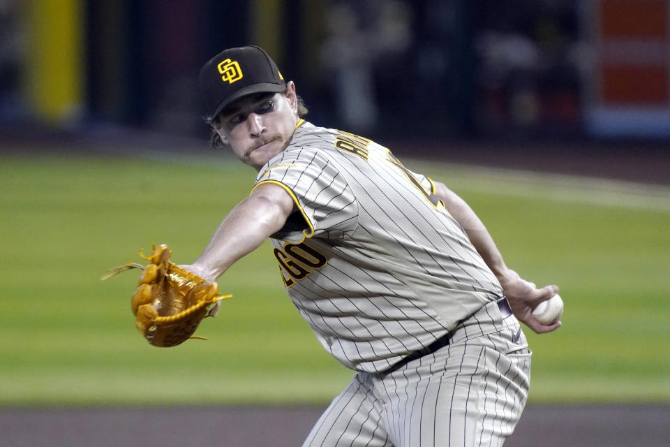 San Diego Padres pitcher Garrett Richards throws against the Arizona Diamondbacks in the first inning during a baseball game, Sunday, Aug 16, 2020, in Phoenix. (AP Photo/Rick Scuteri)