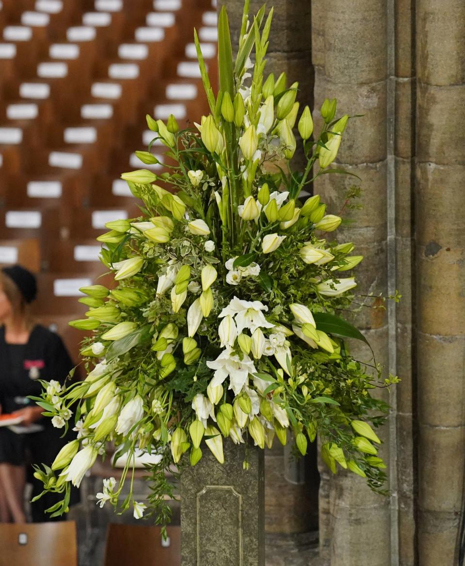 Displays of green and white are taking pride of place in Westminster Abbey (Dominic Lipinski/PA) (PA Wire)