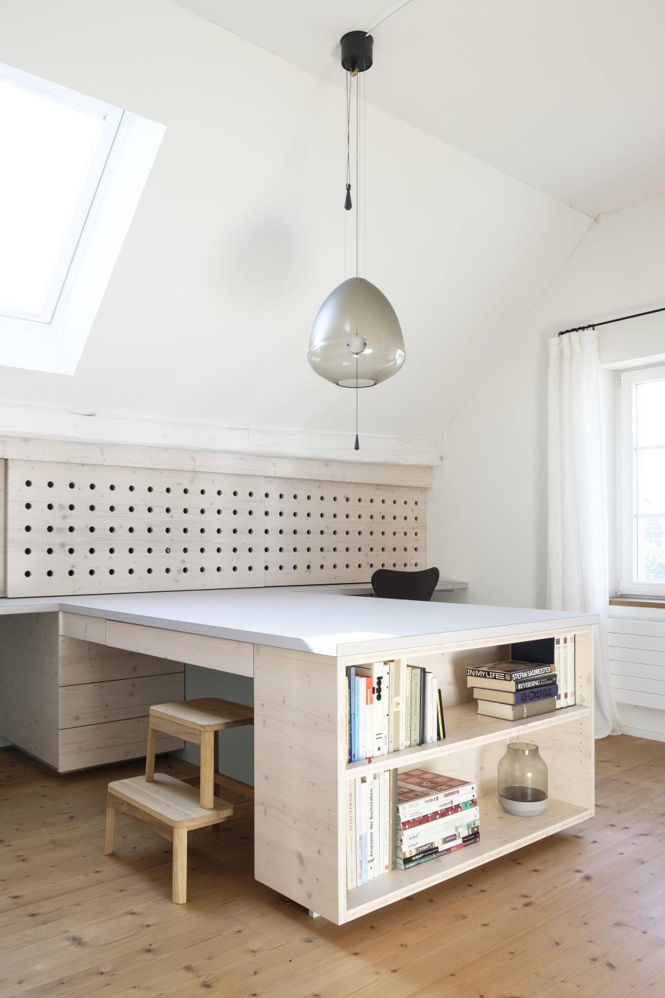 Desk with sliding door under the eaves