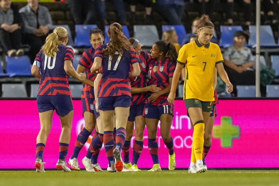 United States' Margaret Purce, second right, is congratulated by teammates after scoring her team's first goal during the international women's soccer match between the United States and Australia in Newcastle, Australia, Tuesday, Nov. 30, 2021. (AP Photo/Mark Baker)