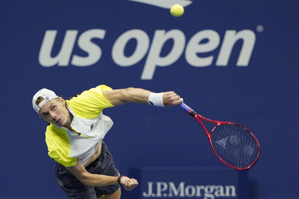 Denis Shapovalov, of Canada, serves to David Goffin, of Belgium, during the fourth round of the US Open tennis championships, Sunday, Sept. 6, 2020, in New York. (AP Photo/Frank Franklin II)