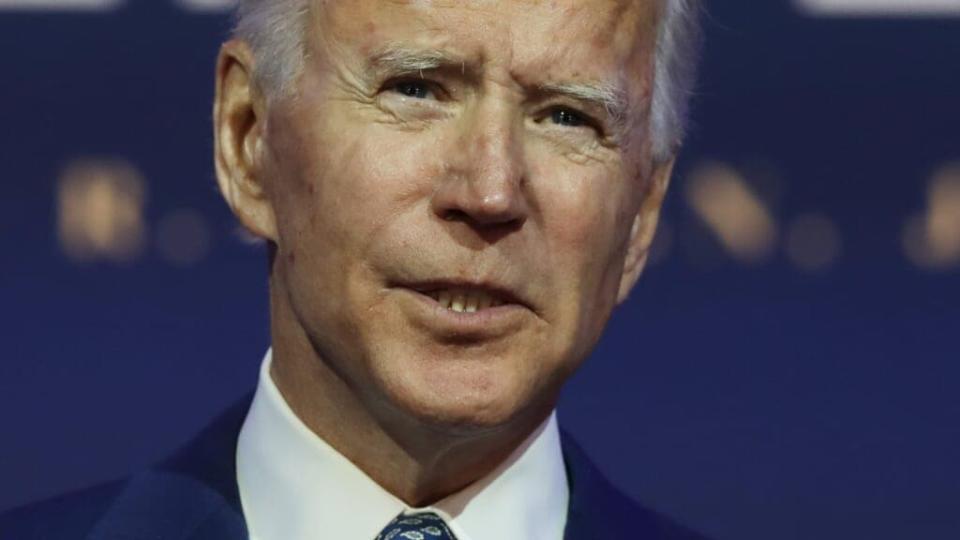 President-elect Joe Biden speaks to the media after receiving a briefing from the transition COVID-19 advisory board Monday at the Queen Theater in Wilmington, Delaware. (Photo by Joe Raedle/Getty Images)