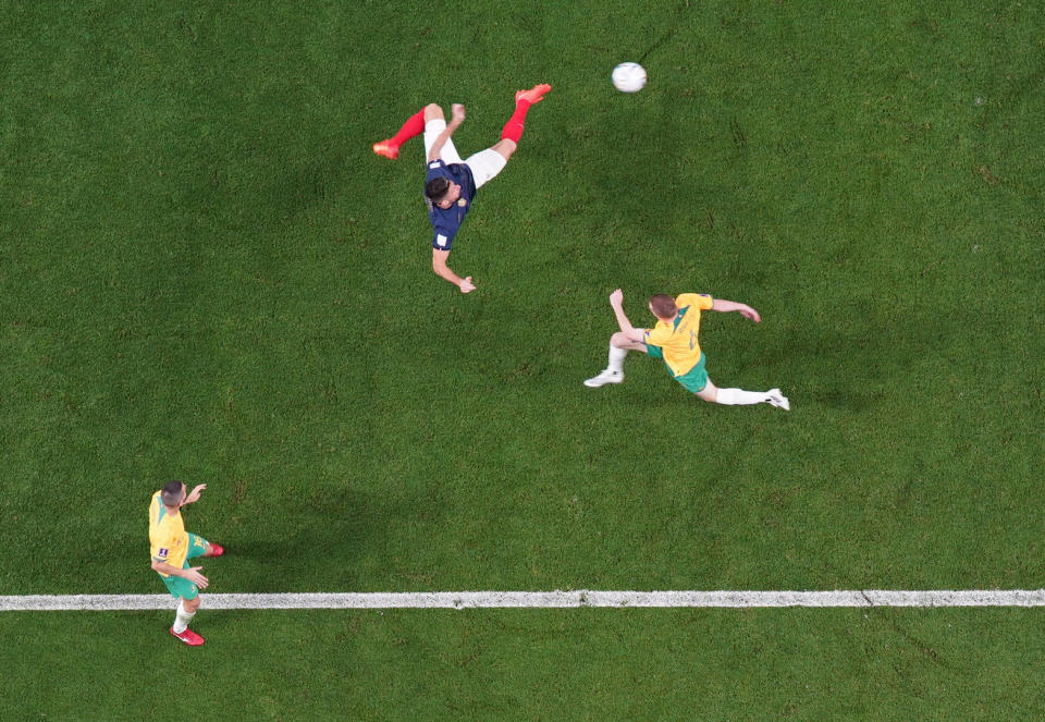 Soccer Football - FIFA World Cup Qatar 2022 - Group D - France v Australia - Al Janoub Stadium, Al Wakrah, Qatar - November 22, 2022  France's Olivier Giroud shoots at goal REUTERS/Kai Pfaffenbach