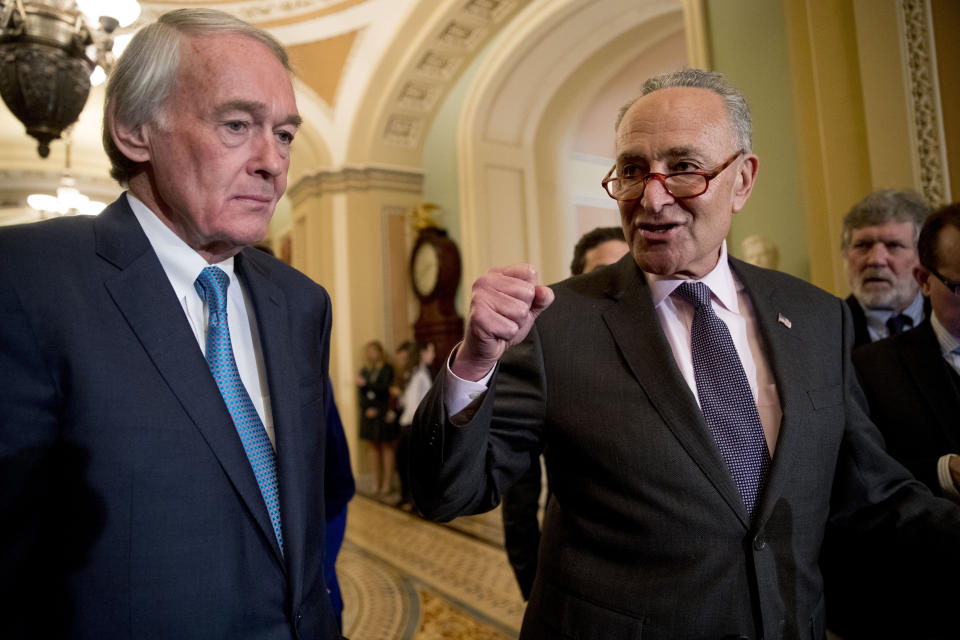 Senate Minority Leader Sen. Chuck Schumer of N.Y., right, accompanied by Sen. Ed Markey, D-Mass., left, speaks to members of the media following a Senate policy luncheon on Capitol Hill in Washington, Tuesday, March 26, 2019. (AP Photo/Andrew Harnik)