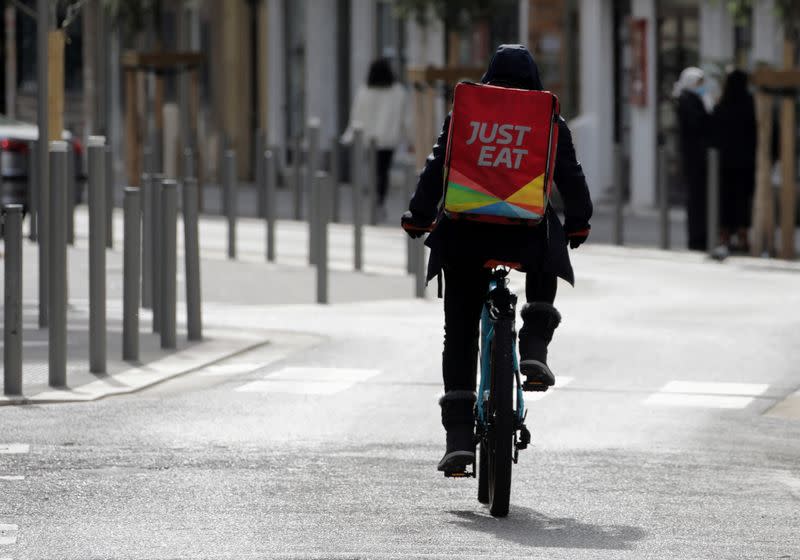 FILE PHOTO: A Just Eat delivery man rides his bicycle in Nice