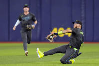 Tampa Bay Rays right fielder Harold Ramirez makes a sliding catch on a fly out by New York Mets' Pete Alonso during the fourth inning of a baseball game Friday, May 3, 2024, in St. Petersburg, Fla. (AP Photo/Chris O'Meara)
