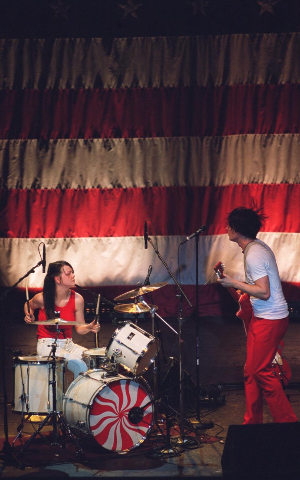Meg White, left, and Jack White of the native Detroit rock band The White Stripes perform the first of two sold-out shows Wednesday night, May 22, 2002, at the Royal Oak Theater in Royal Oak.