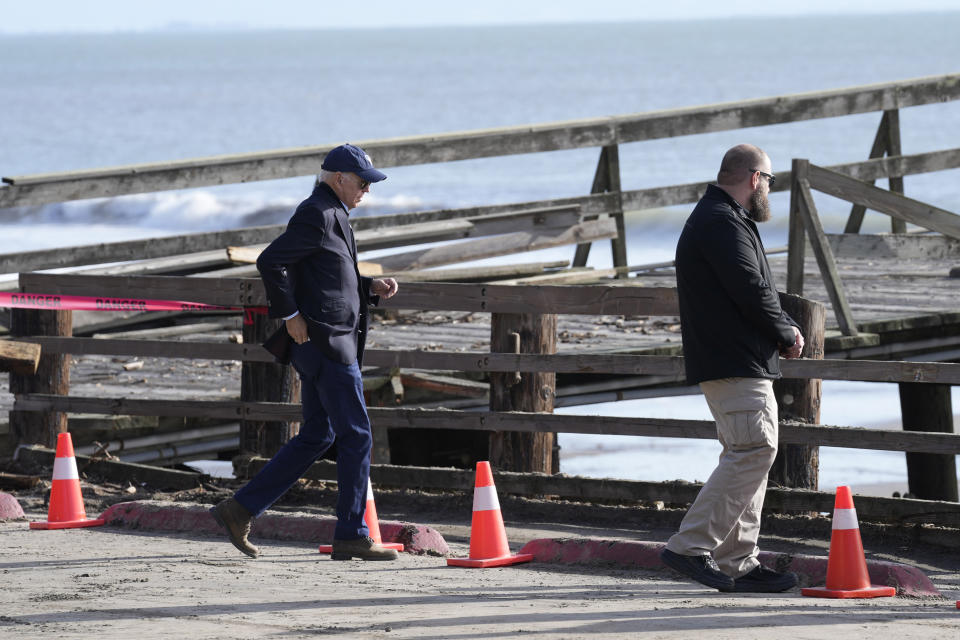 President Joe Biden walks near the destroyed pier before he speaks at Seacliff State Park in Aptos, Calif., Thursday, Jan 19, 2023. (AP Photo/Susan Walsh)