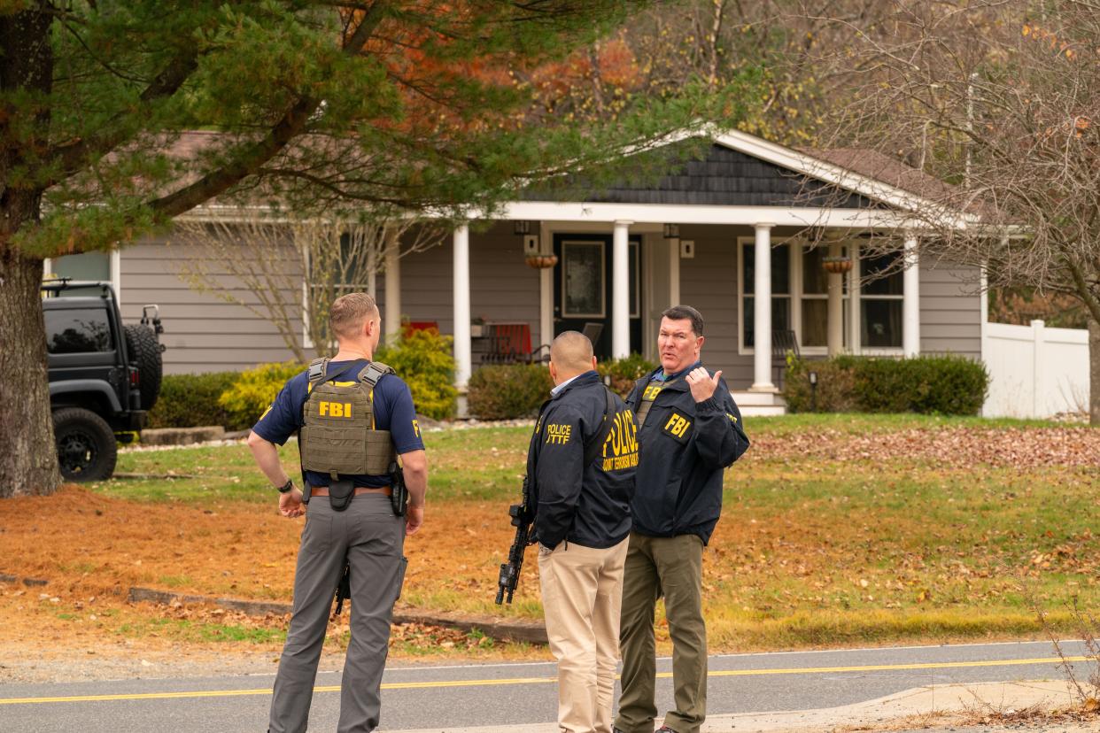 FBI and police with the Joint Terrorist Task Force surround the home of Gregory Yetman on Main Street in Helmetta to execute an arrest warrant for his alleged role in the Jan. 6 Capitol riots.