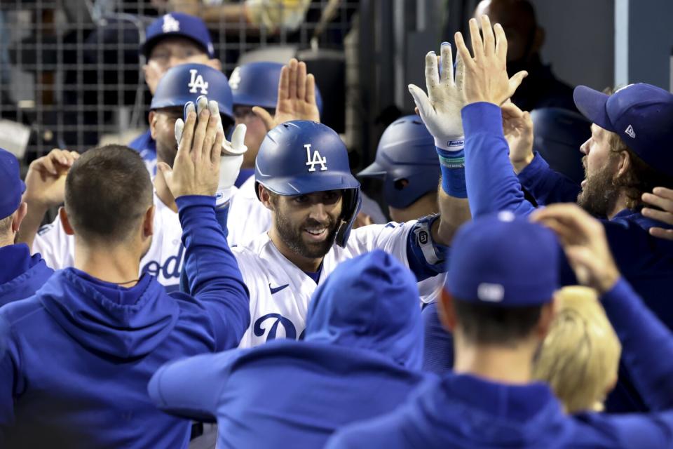 Dodgers' Chris Taylor celebrates.