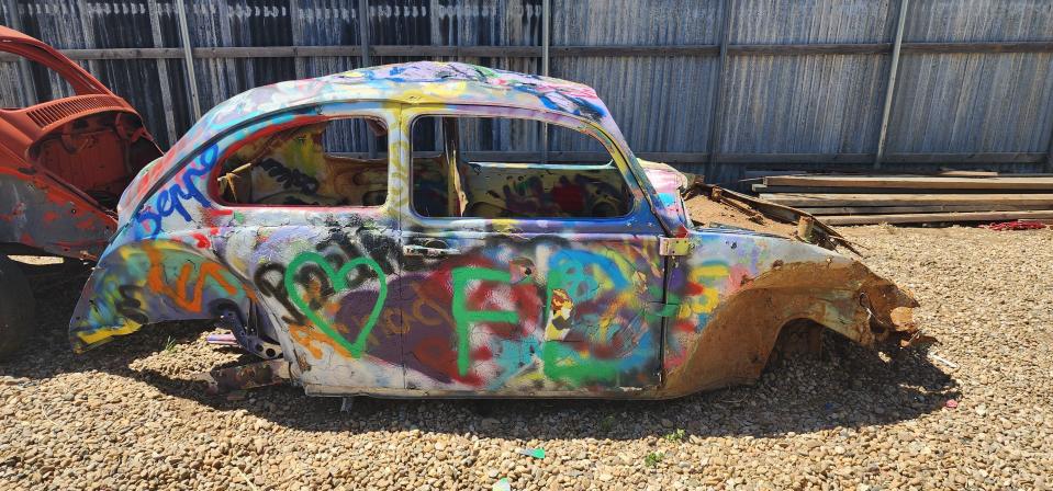 One of the paint covered slug bugs awaiting placement Friday at the new location of the Slug Bug Ranch across from Starlight Ranch.