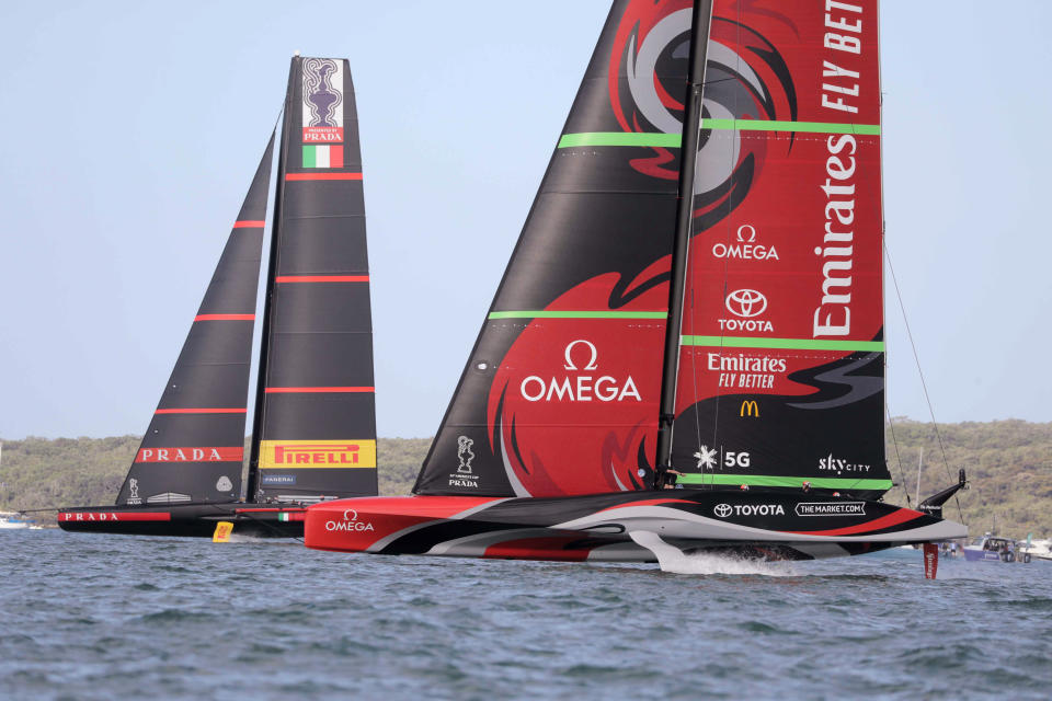 Team New Zealand yacht, right, and Italy's Luna Rossa compete in the America's Cup World Series on the Hauraki Gulf off Auckland, New Zealand, Saturday, Dec. 19, 2020. (Michael Craig/New Zealand Herald via AP)