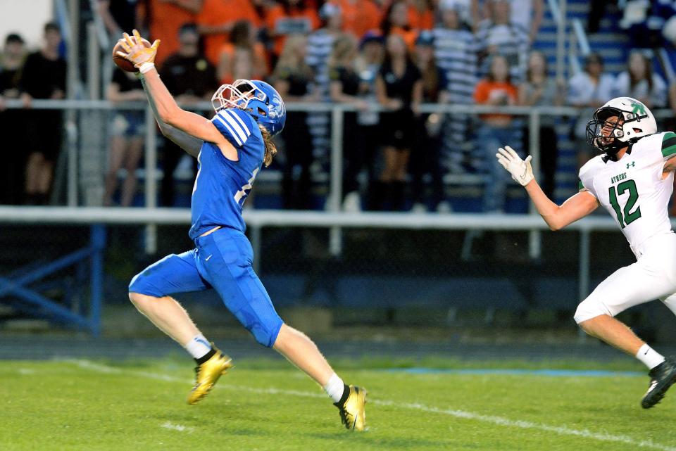 Auburn senior receiver Jackson Kern hauls in a touchdown pass from Talin Kern against Athens on Friday, Sept. 16, 2022.