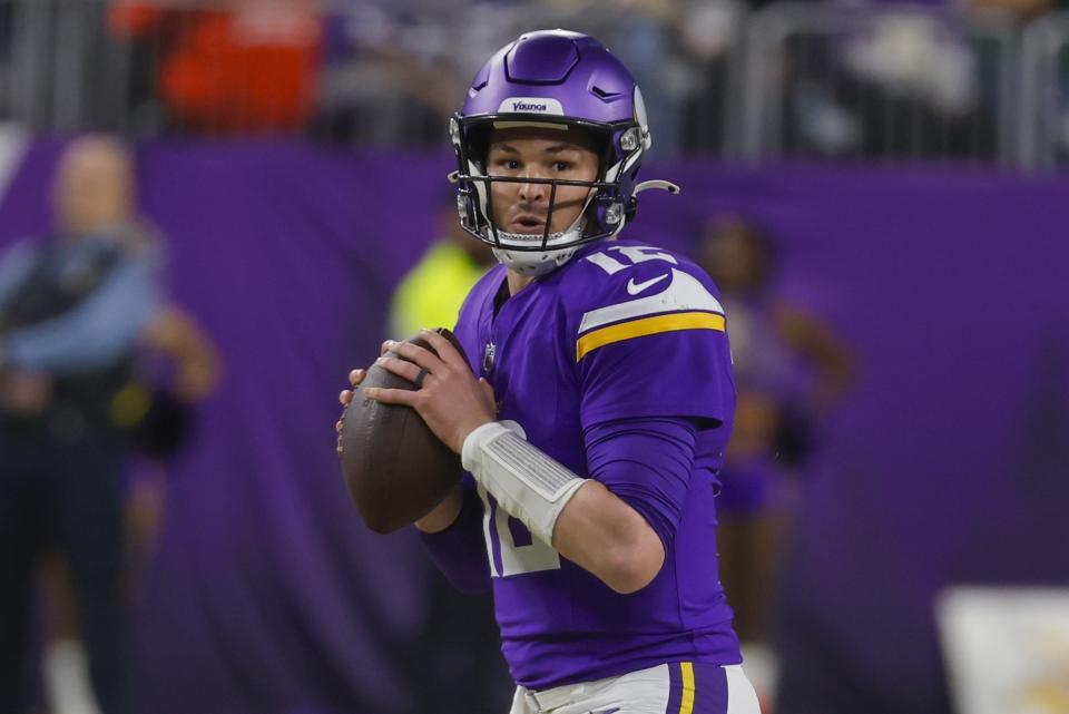 Minnesota Vikings' Nick Mullens looks to throw during the second half of an NFL football game against the Green Bay Packers Sunday, Dec. 31, 2023, in Minneapolis. (AP Photo/Bruce Kluckhohn)