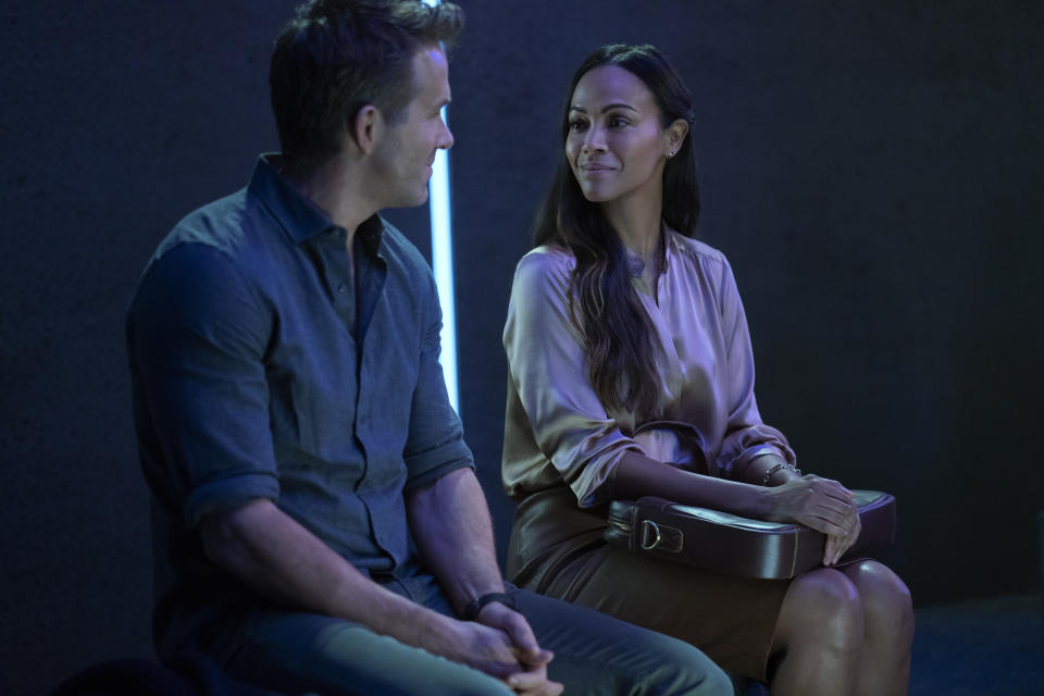 The Adam Project (L to R) Ryan Reynolds as Big Adam and Zoe Saldana as Laura. (Doane Gregory/Netflix)