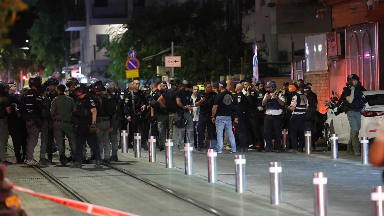 PHOTO: Israeli security and police officers inspect the site of a shooting in Tel Aviv, Israel, October 1, 2024. (Abir Sultan/EPA via Shutterstock)