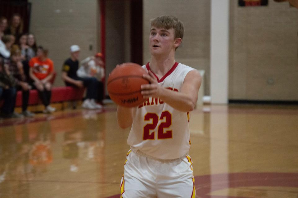 Reading senior Maverick Messenger (22) hit three free throws in the fourth quarter to help the Rangers escape with a homecoming win over Quincy.