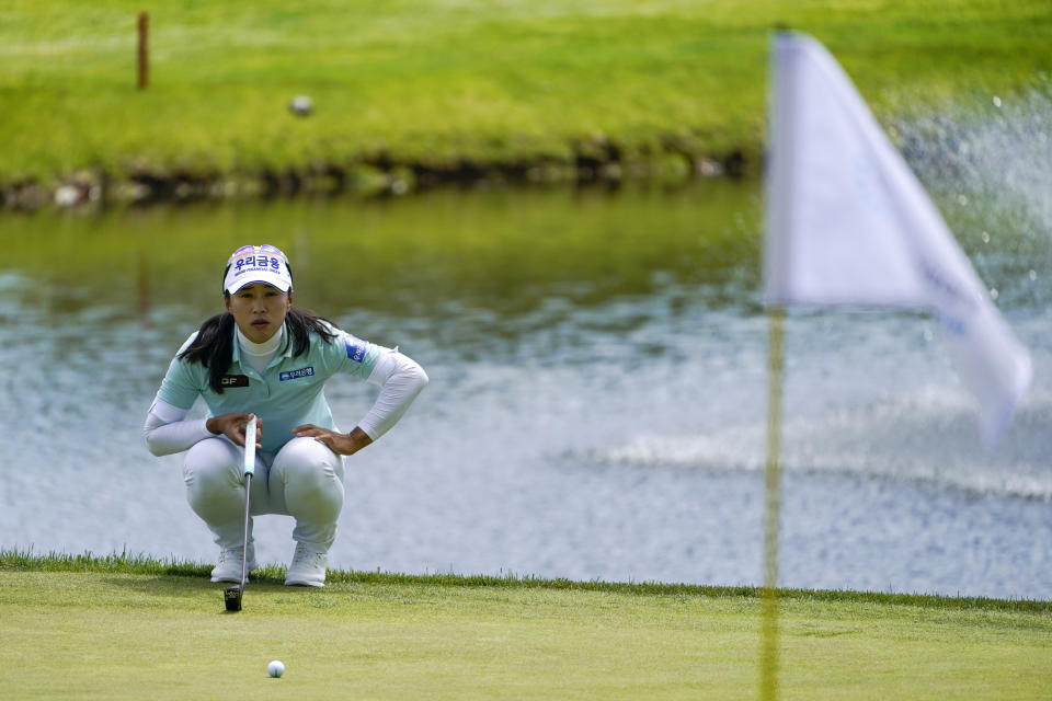 Amy Yang, of South Korea, lines up her putt on the ninth green during the first round of the LPGA Cognizant Founders Cup golf tournament, Thursday, May 12, 2022, in Clifton, N.J. (AP Photo/Seth Wenig)