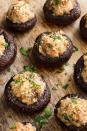 <p>Save room for these shrooms.</p><p>Get the <a href="https://www.delish.com/uk/cooking/recipes/a29707397/easy-stuffed-mushroom-recipe/" rel="nofollow noopener" target="_blank" data-ylk="slk:Stuffed Mushrooms;elm:context_link;itc:0;sec:content-canvas" class="link ">Stuffed Mushrooms</a> recipe.</p>