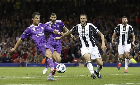 Britain Soccer Football - Juventus v Real Madrid - UEFA Champions League Final - The National Stadium of Wales, Cardiff - June 3, 2017 Real Madrid's Cristiano Ronaldo scores their third goal Reuters / Carl Recine Livepic
