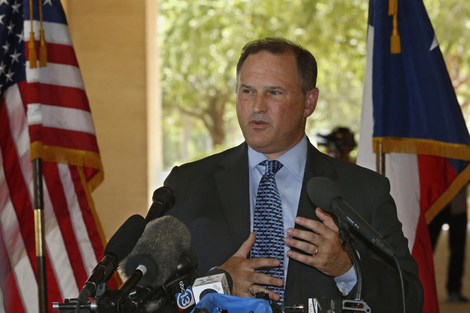 FILE - In this Sept. 2, 2019, file photo Christopher Combs, Special Agent in Charge of the San Antonio FBI, answers a question about Saturday's shooting incident, in Odessa, Texas. Combs said gunman Seth Ator had been on a long downward spiral, even before getting fired from his oil-services job Saturday morning and that Ator called 911 both before and after the shooting began. (AP Photo/Sue Ogrocki, File)