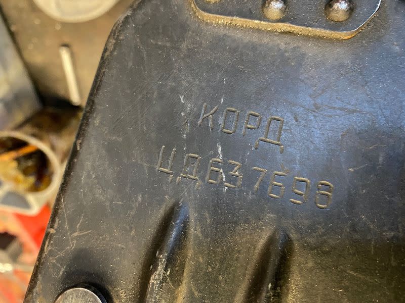 An etching on the back of a Kord machine gun that auto mechanics in Kyiv said was recovered from Russian forces