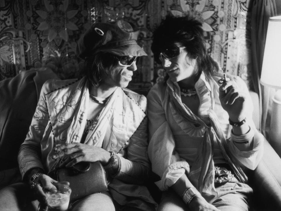 Rolling Stones guitarists Keith Richards (left) and Ron Wood (right) chat onboard the Starship in 1975.