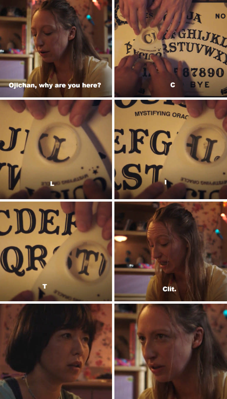 Ouija board spelling out "CLIT"