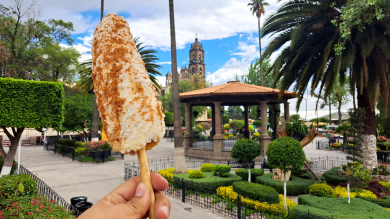 Mexican streetscape with elote