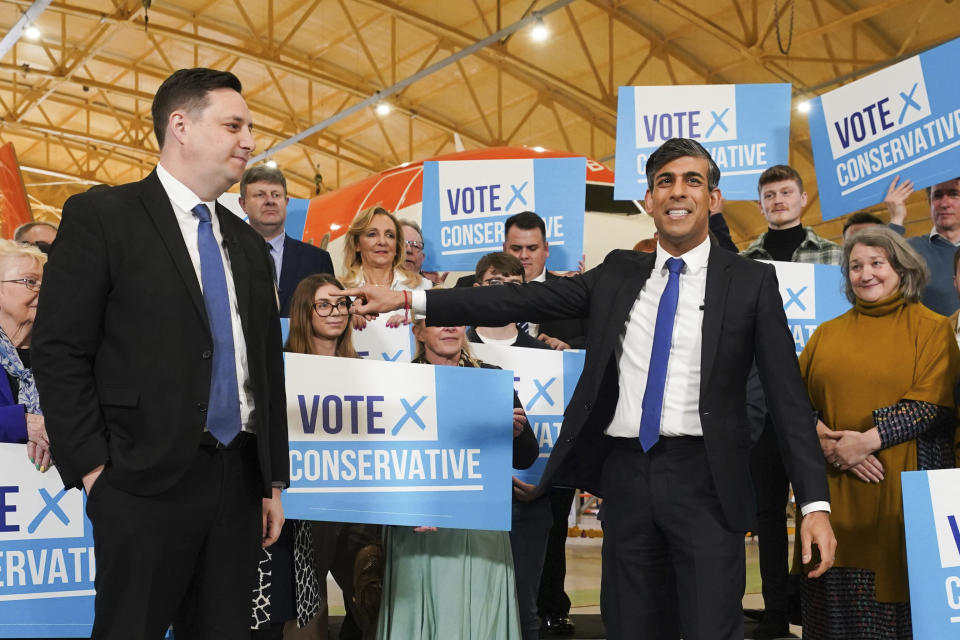 Conservative party candidate Lord Ben Houchen, left, with Britain's Prime Minister Rishi Sunak following his re-election as Tees Valley Mayor in Teesside, England, Friday May 3, 2024. (Owen Humphreys/PA via AP)