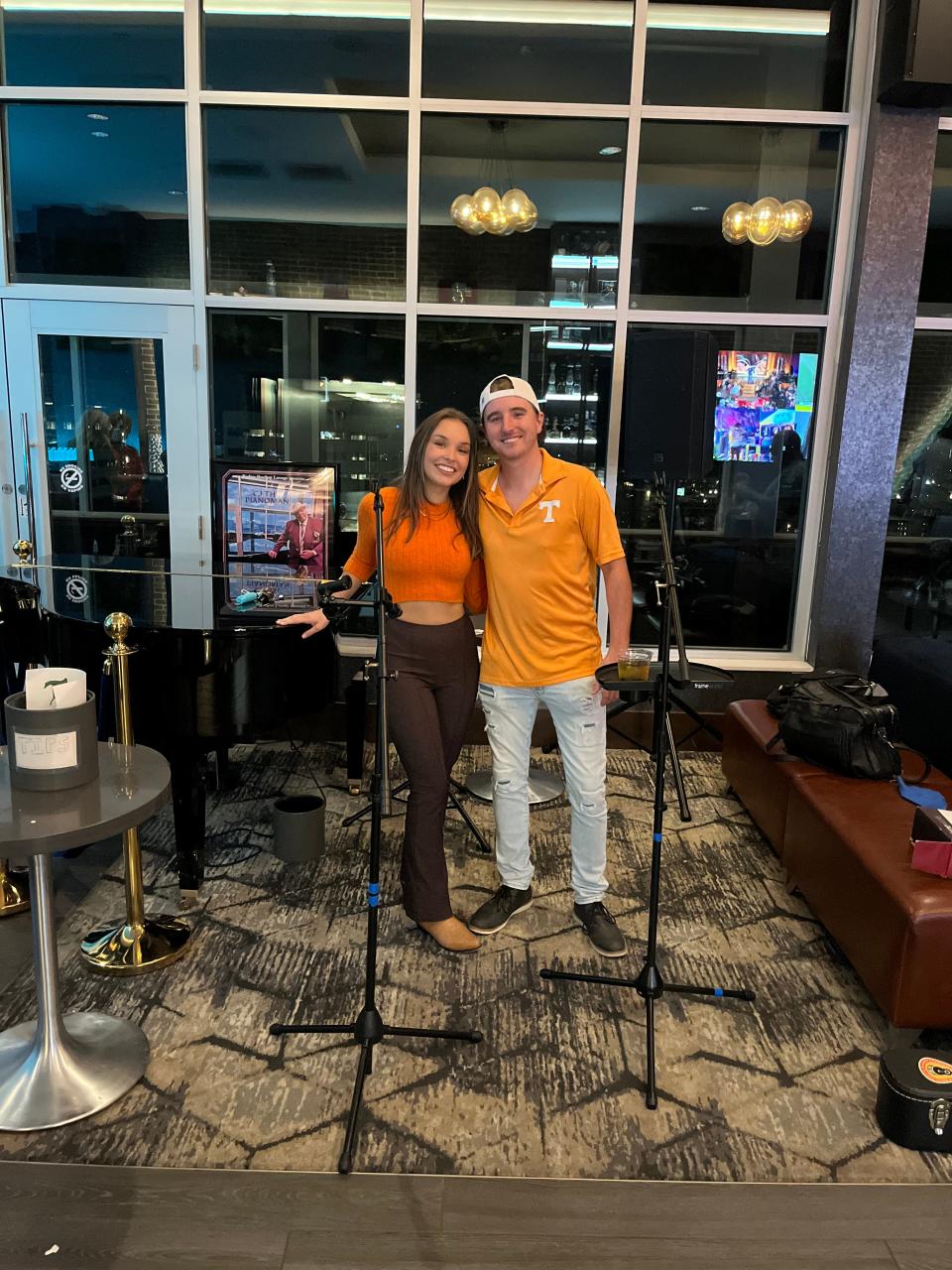 “When I was younger, I took guitar lessons, but when I was a cheerleader I had to give them up,” said singer Maddy Dishner. “I’m super thankful for Bo (Compton), who plays guitar with me.” At Embassy Suites Radius Rooftop Lounge, Sept. 22, 2022.