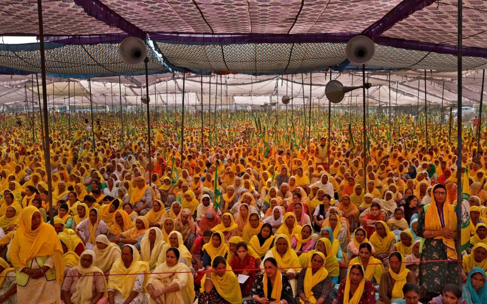 Women farmers attend a protest against farm laws in India - Danish Siddiqui/Reuters