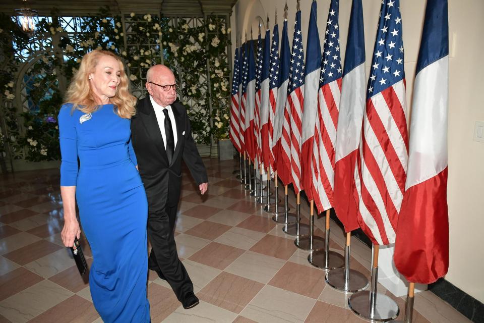 Mogul on the move: Rupert Murdoch and his wife Jerry Hall: AFP/Getty Images