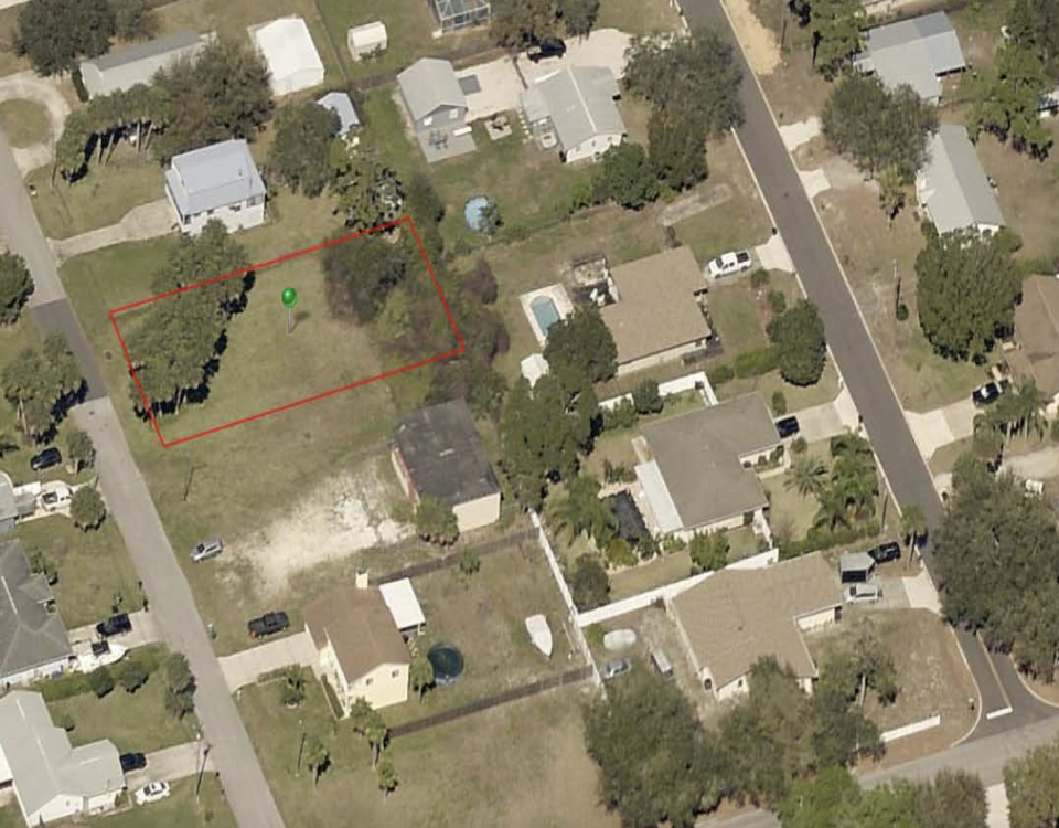 Property at Nordman Avenue in New Smyrna Beach. The lot, along with three other city-owned properties, will be donated by the city through an application process so that it can be used for an affordable housing development.