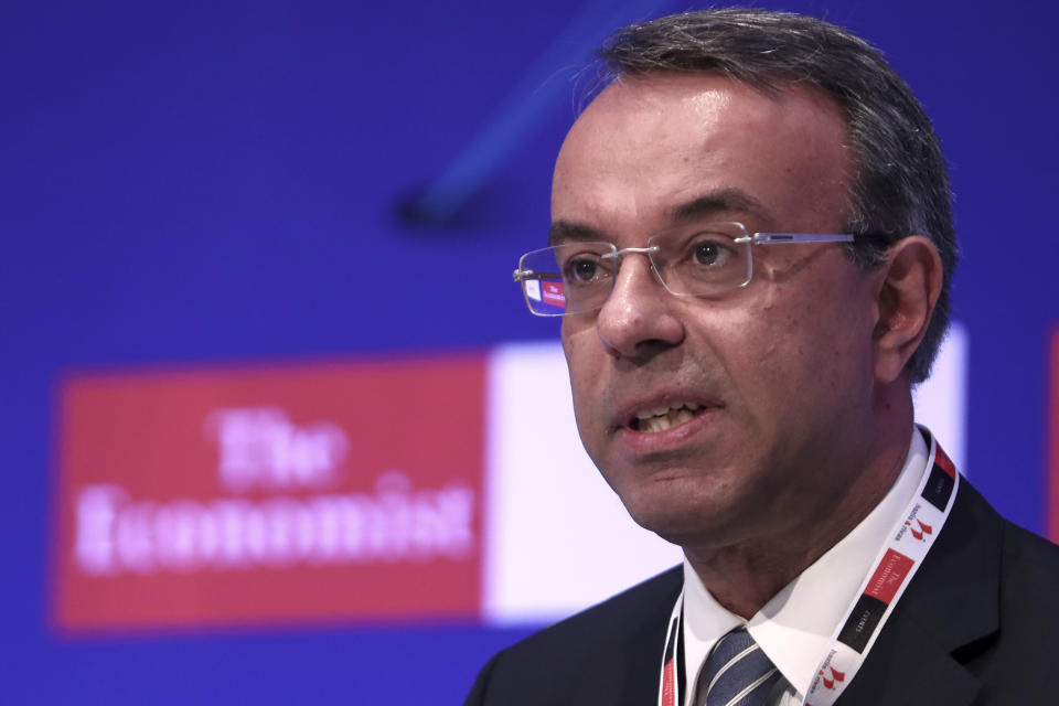 Christos Staikouras, Greece's Finance Minister, speaks at a financial conference in Lagonisi, south of Athens on Tuesday, July 16, 2019. Authorities in Greece say the country is planning tap financial markets with the issue of a 7-year bond, the first under the new conservative government of Prime Minister Kyriakos Mistotakis. (AP Photo/Yorgos Karahalis)