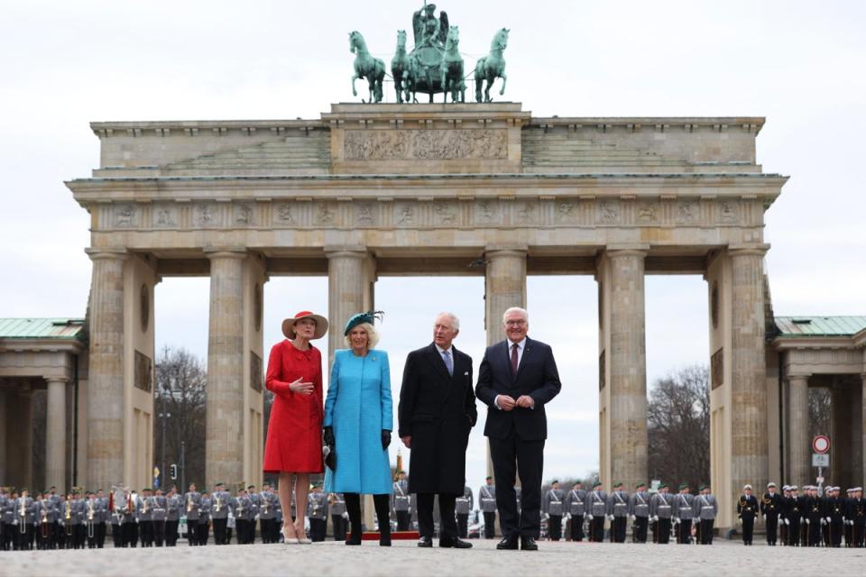 Pictured left to right: the German President's wife Elke Buedenbender, Camilla, Queen Consort, King Charles III and German President Frank-Walter Steinmeier attend a ceremonial welcome at Brandenburg Gate in Berlin (AFP/Getty)