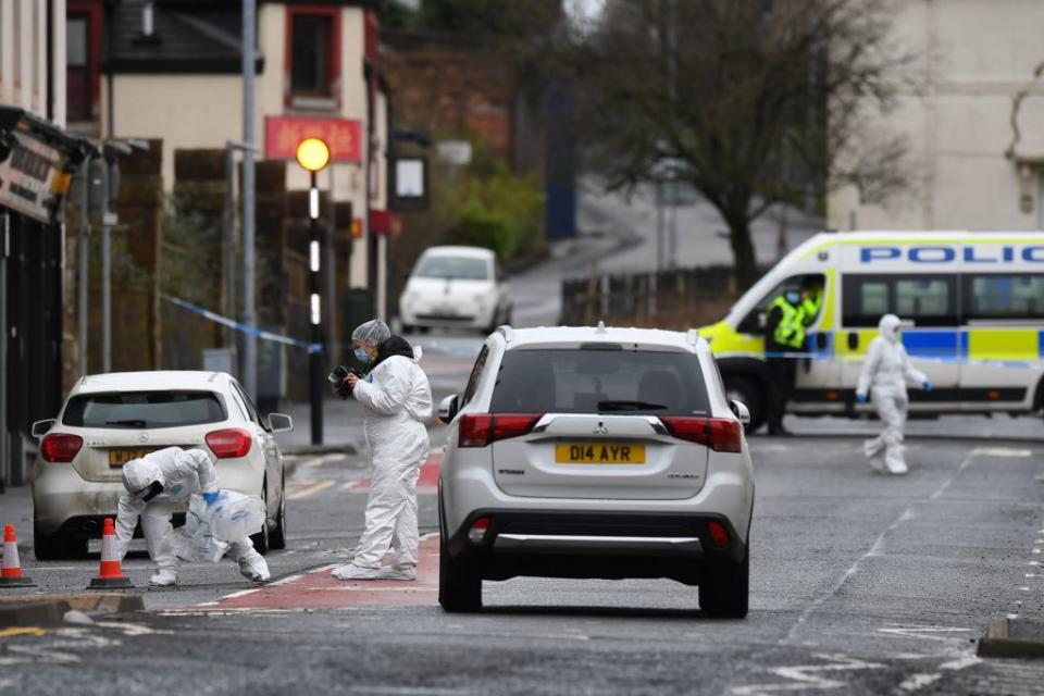 Police forensics officers work at the scene where Nicole was stabbed, in west Scotland. Source: AFP