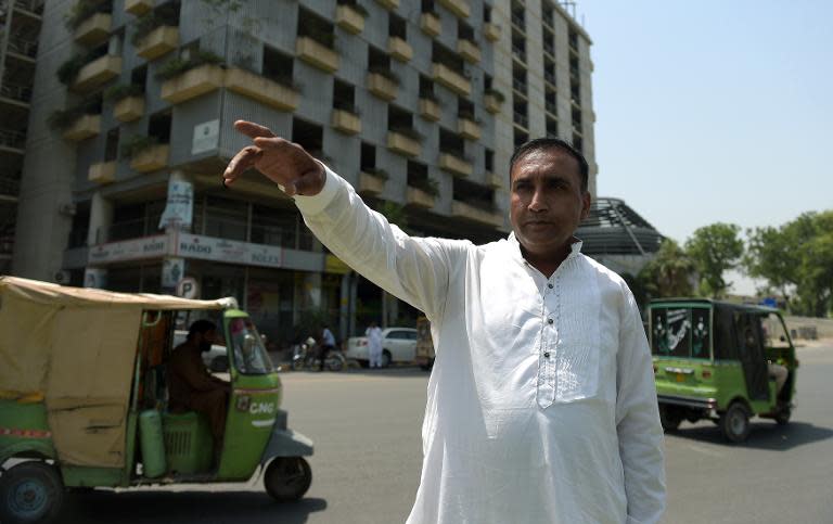 Pakistani bus driver Meher Khalil, who drove the Sri Lankan cricket team to safety when it came under a gun and grenade attack by militants in March 2009, speaks to AFP at the site of the attack in Lahore on May 21, 2015