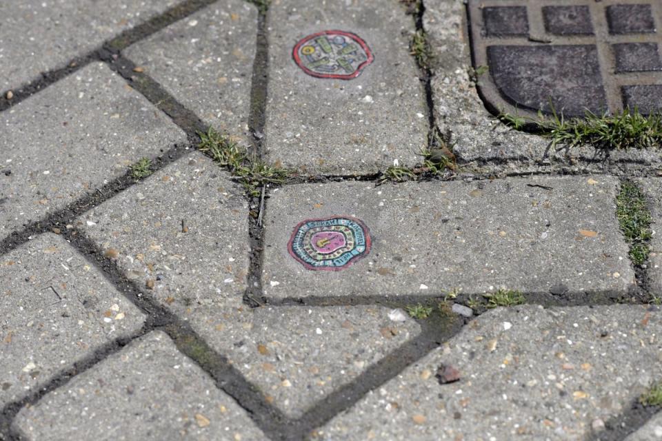 Local artist Ben Wilson paints chewing gum on Muswell Hill’s streets (Daniel Lynch)